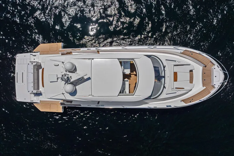 Slide: The Image of Overhead view of 2025 Tiara Yachts EX 60 luxury yacht on water. - 61