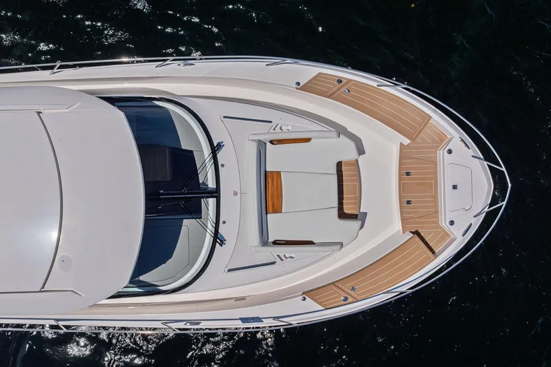 Slide: The Image of Aerial view of 2025 Tiara Yachts EX 60, showcasing sleek design and spacious deck. - 79