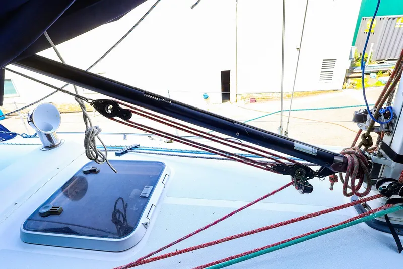 Slide: The Image of Deck view of a 2001 J Boats J/32 sailboat, featuring rigging and hatch. - 20