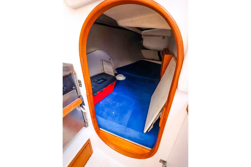 Slide: The Image of Interior cabin view of a 2001 J Boats J/32 sailboat, featuring a cozy sleeping area. - 42