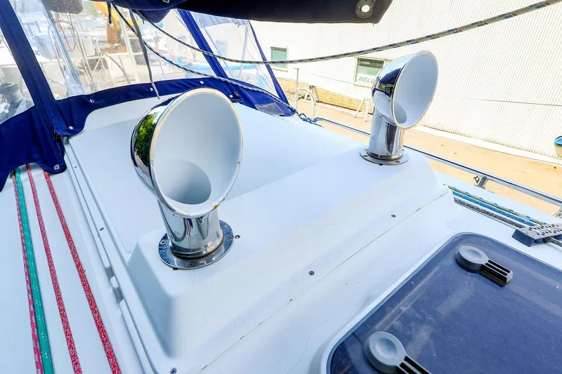 Slide: The Image of 2001 J Boats J/32 deck with chrome vents and colorful ropes. - 16