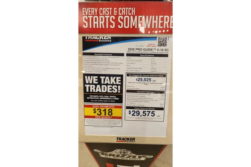 Slide: The Image of 2026 Tracker Pro Guide V-16 SC boat advertisement with pricing and trade-in options. - 2