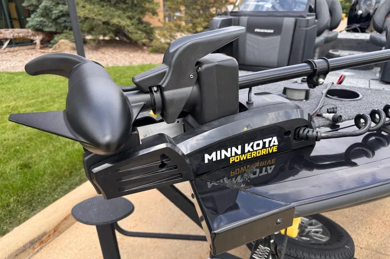 Slide: The Image of Minn Kota PowerDrive motor on 2026 Tracker Targa V-19 WT boat, outdoor setting. - 4