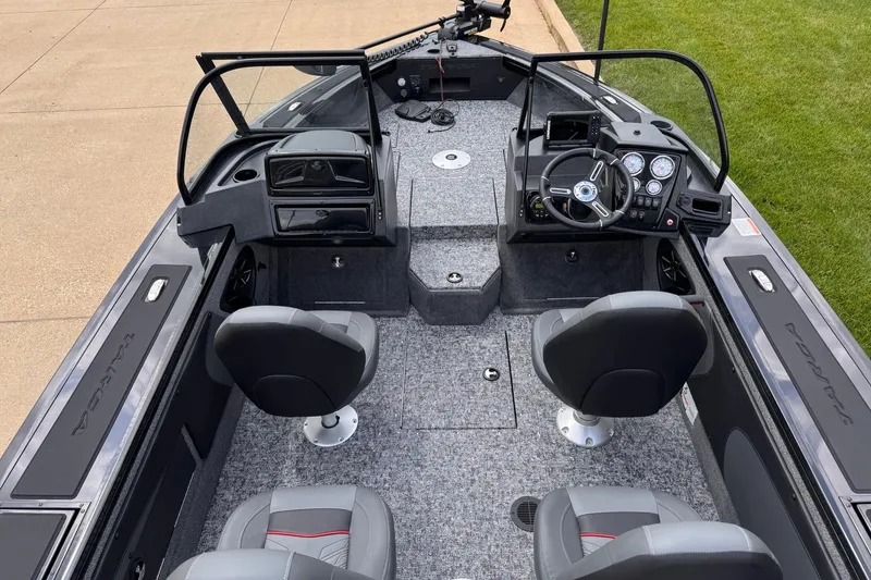 Slide: The Image of Interior view of 2026 Tracker Targa V-19 WT boat with modern seating and dashboard. - 6