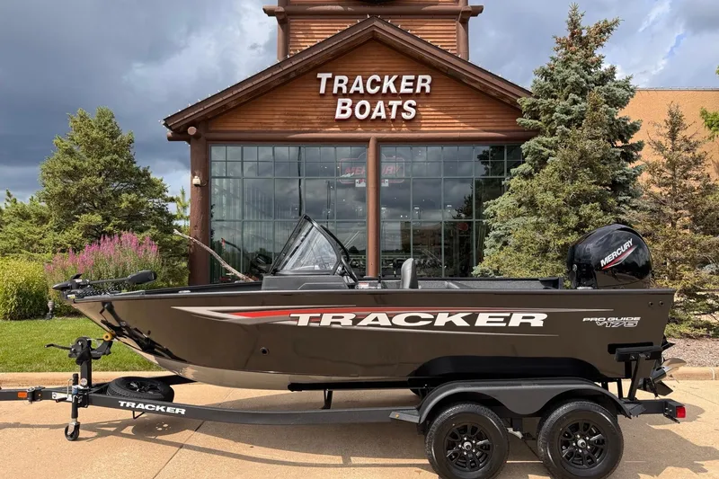 The Image of 2026 Tracker Pro Guide V-175 WT boat displayed outside Tracker Boats showroom. - 0