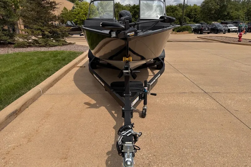 Slide: The Image of 2026 Tracker Pro Guide V-175 WT boat on trailer in parking lot. - 3