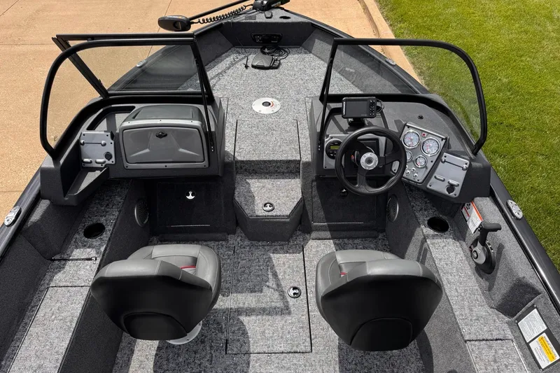 Slide: The Image of 2026 Tracker Pro Guide V-175 WT boat interior with dual seats and modern dashboard. - 5