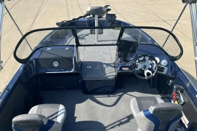 Slide: The Image of 2026 Nitro ZV19 Sport Pro boat interior with steering wheel and seating. - 6