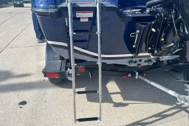 Slide: The Image of Rear view of 2026 Nitro ZV19 Sport Pro boat with ladder extended. - 9
