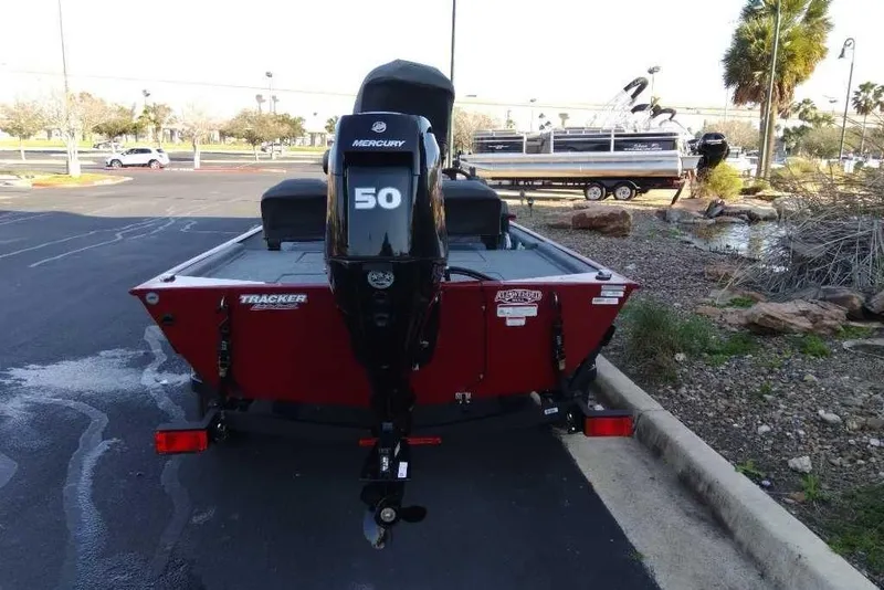 Slide: The Image of 2026 Tracker Bass Tracker Classic XL boat with Mercury 50 engine in parking lot. - 3