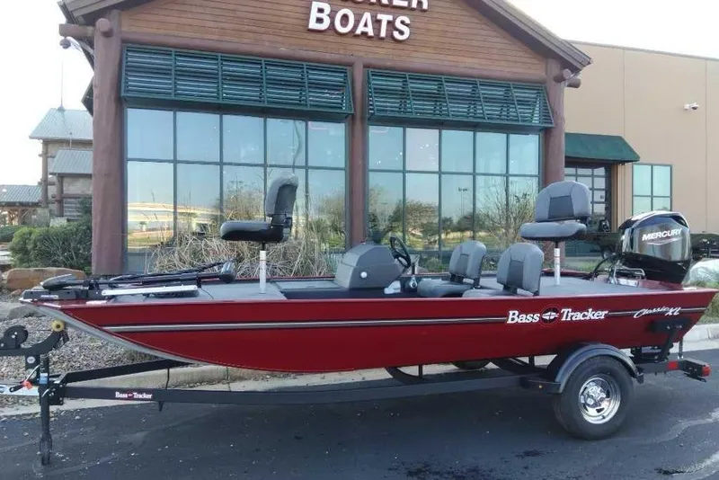 The Image of 2026 Tracker Bass Tracker Classic XL boat displayed outside a dealership. - 0