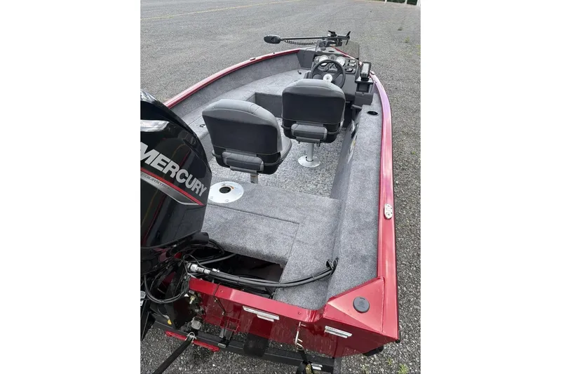 Slide: The Image of 2026 Tracker Super Guide V-16 SC boat with dual seats and Mercury engine. - 7