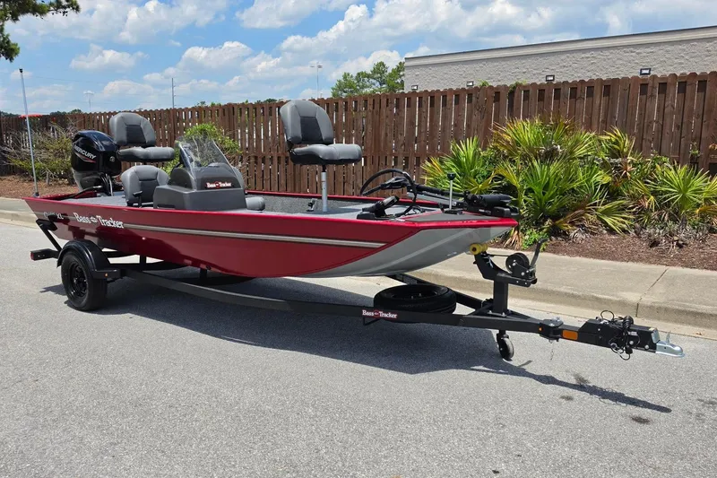 Slide: The Image of 2026 Tracker Bass Tracker Classic XL boat on trailer, parked outdoors. - 4