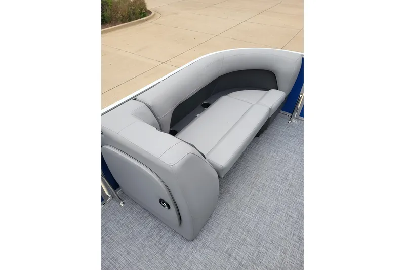 Slide: The Image of 2026 Sun Tracker Party Barge 18 DLX with gray seating and spacious deck area. - 4