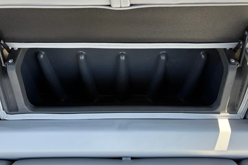 Slide: The Image of Storage compartment in 2026 Sun Tracker Sportfish 24 XP3 boat, featuring sleek design and ample space. - 34