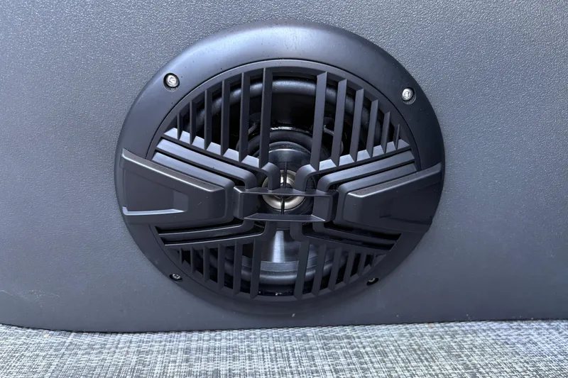 Slide: The Image of Close-up of a speaker on a 2026 Sun Tracker Sportfish 24 XP3 boat. - 24