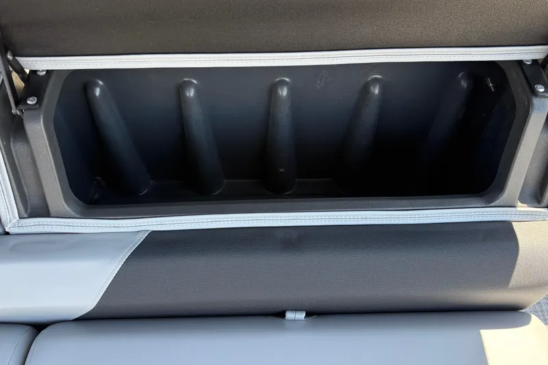 Slide: The Image of Storage compartment in 2026 Sun Tracker Sportfish 24 XP3 boat, featuring sleek design and ample space. - 31