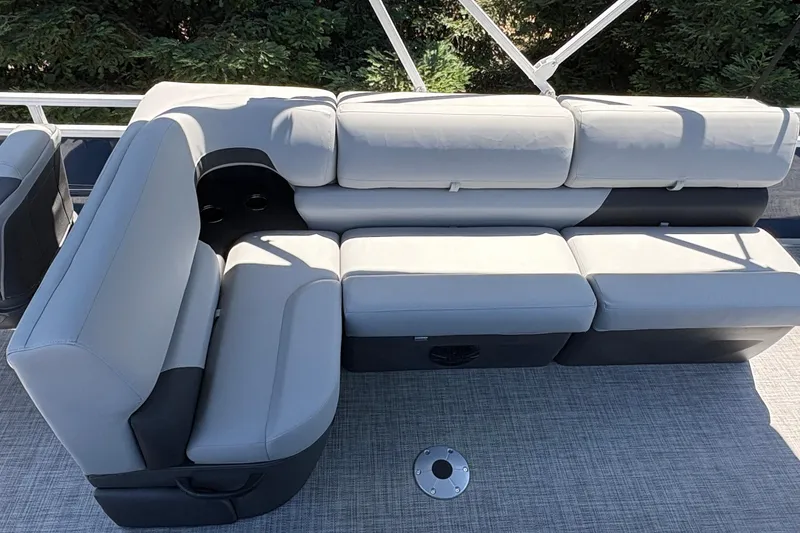 Slide: The Image of Luxurious seating on 2026 Sun Tracker Sportfish 24 XP3 pontoon boat, featuring plush cushions. - 14