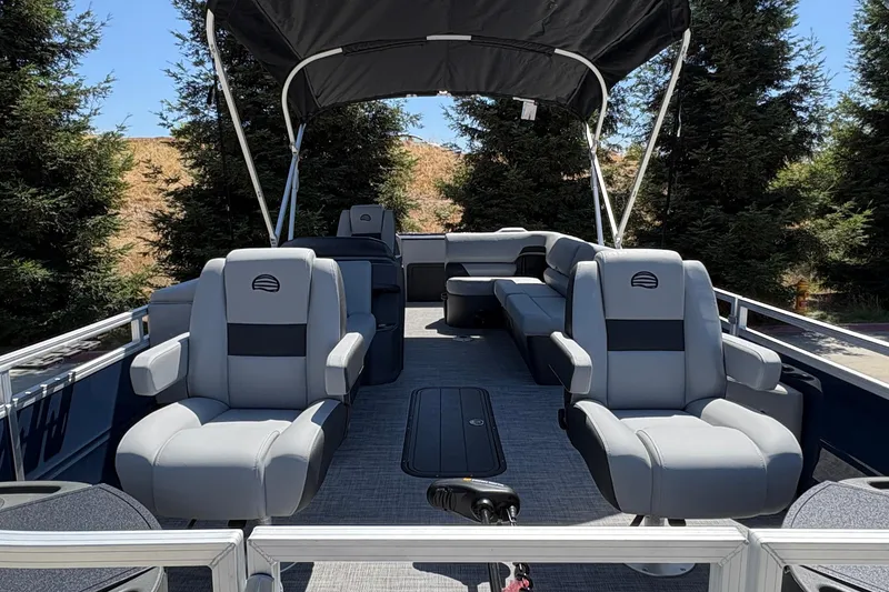 Slide: The Image of 2026 Sun Tracker Sportfish 24 XP3 pontoon boat with spacious seating and canopy. - 15