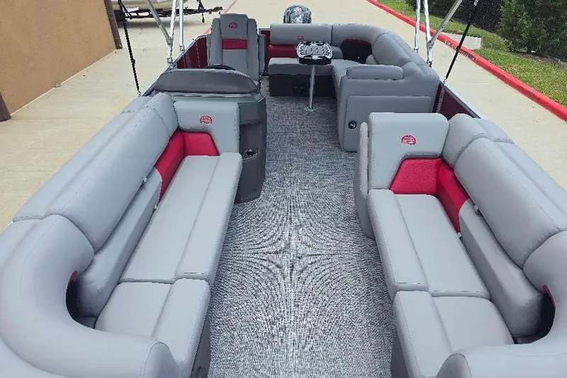 Slide: The Image of 2026 Sun Tracker Party Barge 20 DLX interior with spacious seating and modern design. - 6
