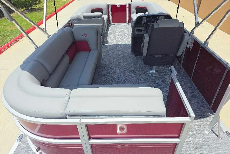 Slide: The Image of 2026 Sun Tracker Party Barge 20 DLX interior with spacious seating and modern design. - 18