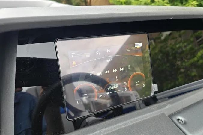 Slide: The Image of Touchscreen display on 2026 Sun Tracker Party Barge 20 DLX, showing navigation and media controls. - 14