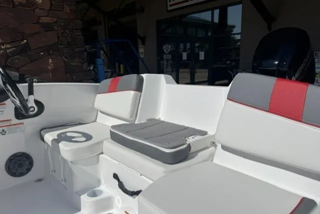 Slide: The Image of 2026 Tahoe T16 boat interior with white and red seating, showcasing modern design. - 7