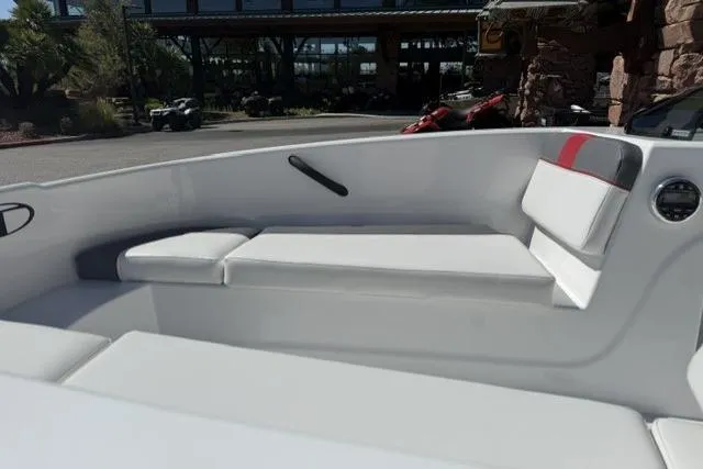 Slide: The Image of 2026 Tahoe T16 boat interior with white seating and modern design. - 8