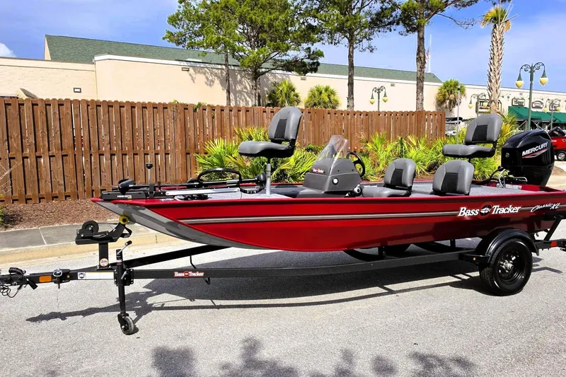 Slide: The Image of 2026 Tracker Bass Tracker Classic XL boat on trailer, parked outdoors. - 8