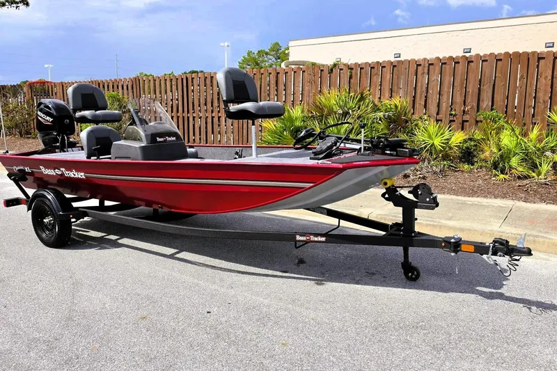 Slide: The Image of 2026 Tracker Bass Tracker Classic XL boat on trailer, parked outdoors. - 3