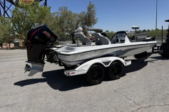 Slide: The Image of 2026 Nitro Z19 XL Pro boat with powerful outboard motor on a trailer. - 1