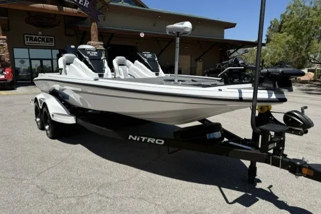Slide: The Image of 2026 Nitro Z19 XL Pro boat on trailer outside Tracker store. - 2