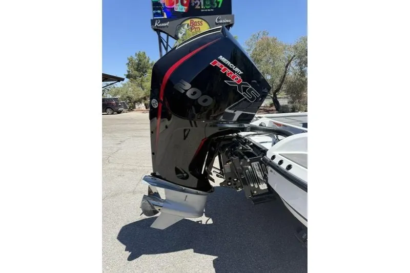 Slide: The Image of 2026 Nitro Z19 XL Pro boat with Mercury Pro XS 200 engine in outdoor setting. - 6