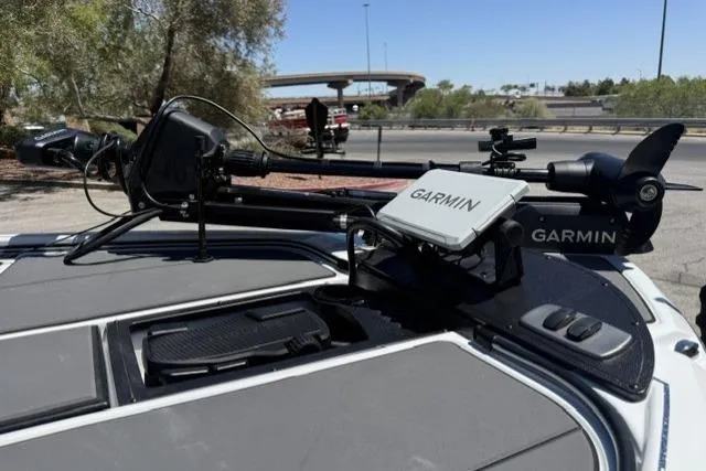 Slide: The Image of 2026 Nitro Z19 XL Pro boat with Garmin equipment on deck, parked near highway. - 8