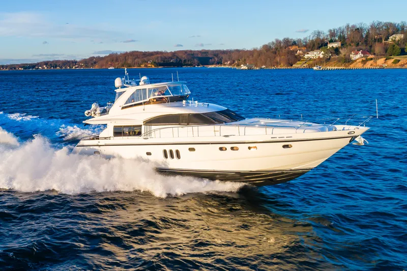 The Image of 2006 Princess 75 Motor Yacht cruising on open water. - 0