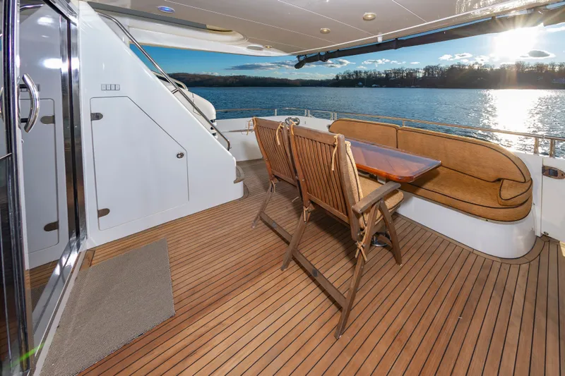 Slide: The Image of Deck of Princess 75 Yacht with wooden furniture, 2006. - 11