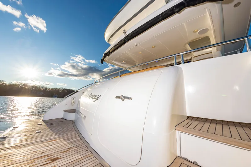 Slide: The Image of 2006 Princess 75 Motor Yacht on calm water at sunset. - 12