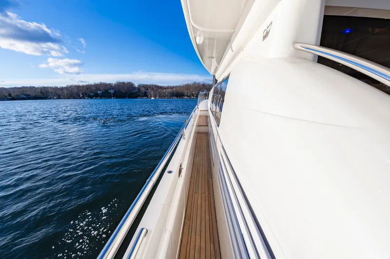 Slide: The Image of 2006 Princess 75 Motor Yacht cruising on calm waters. - 13