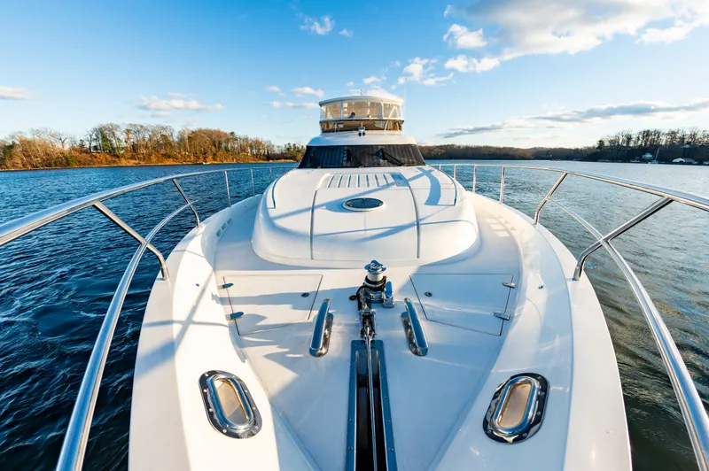 Slide: The Image of 2006 Princess 75 Motor Yacht on calm water under sunny skies. - 15