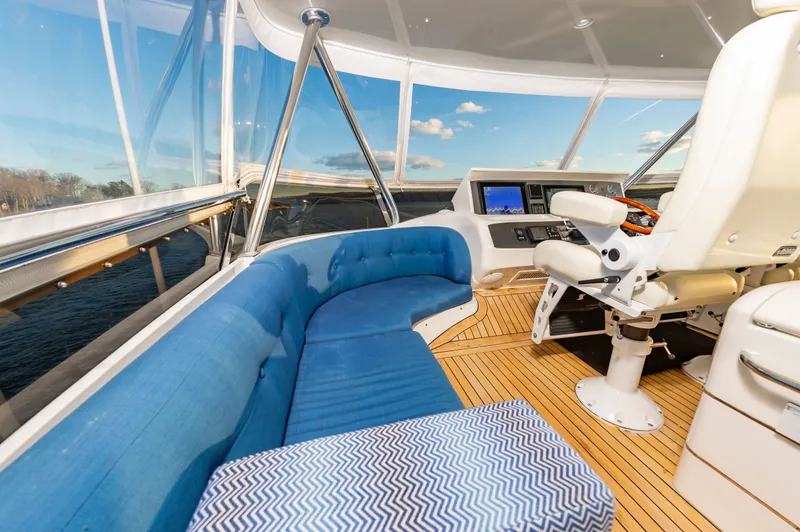 Slide: The Image of Interior of a 2006 Princess 75 Yacht with blue seating. - 28
