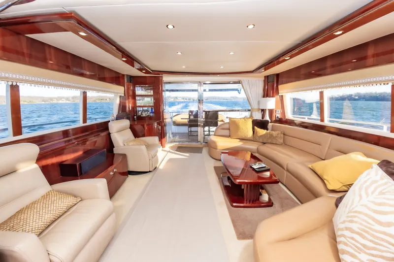 Slide: The Image of Luxurious interior of a 2006 Princess 75 Motor Yacht on the water. - 32