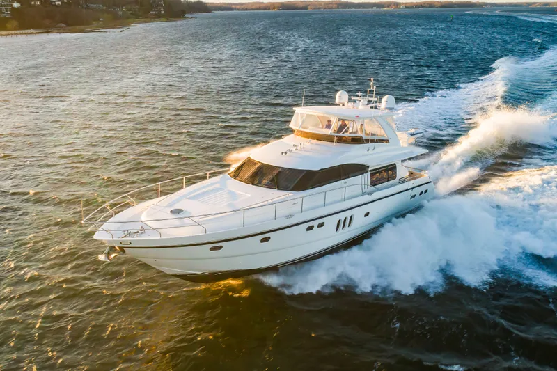 Slide: The Image of 2006 Princess 75 Motor Yacht cruising on water. - 4