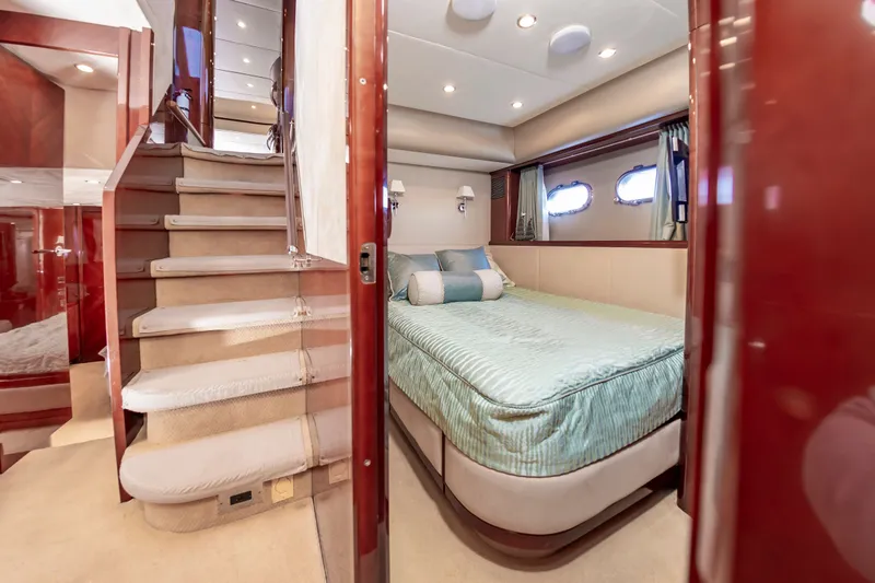 Slide: The Image of Luxurious bedroom in a 2006 Princess 75 Motor Yacht. - 49