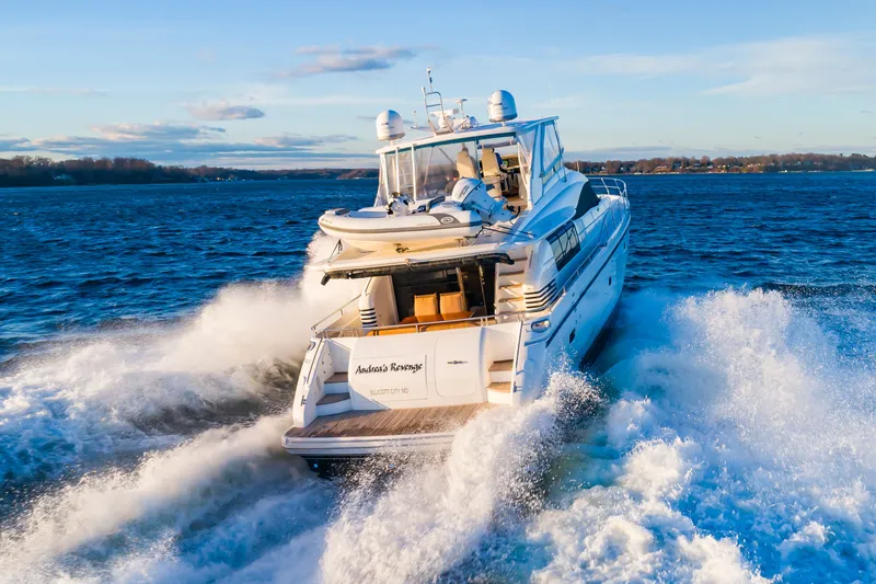 Slide: The Image of 2006 Princess 75 Motor Yacht cruising on open water. - 5