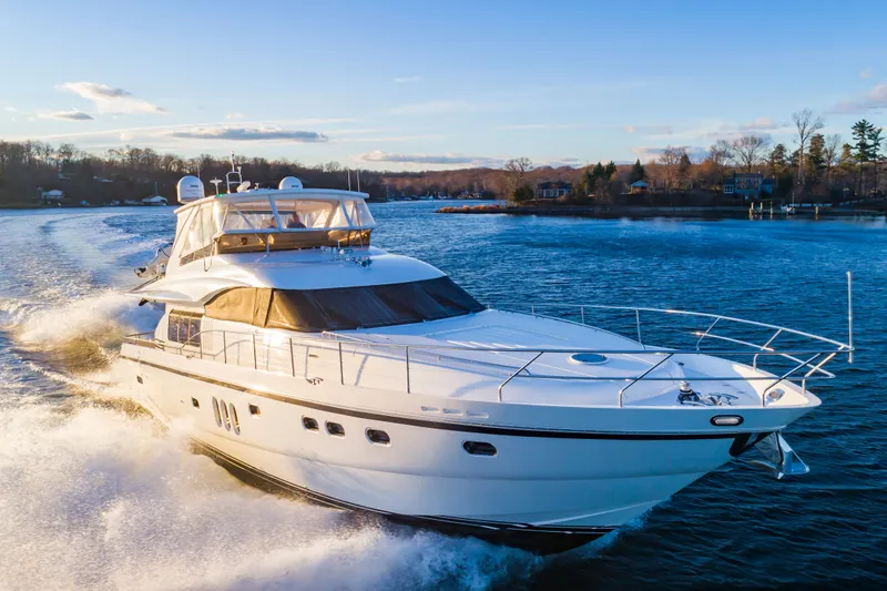 Slide: The Image of 2006 Princess 75 Motor Yacht cruising on calm water. - 6
