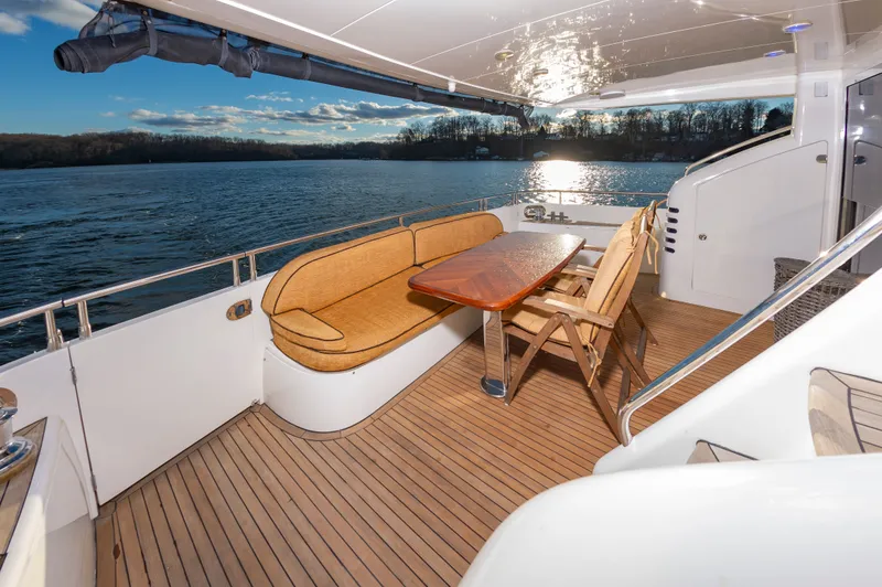Slide: The Image of Deck area of 2006 Princess 75 Yacht on the water. - 8