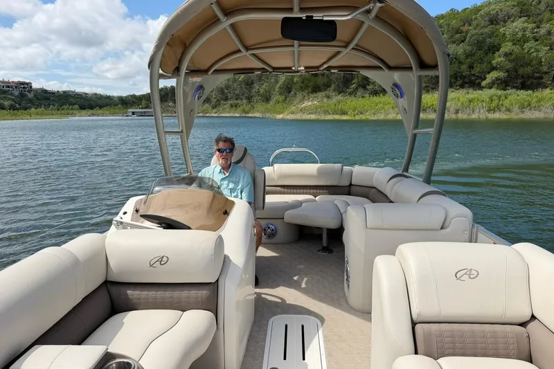 Slide: The Image of 2017 Avalon Catalina Platinum 2585 pontoon boat on a scenic lake. - 34