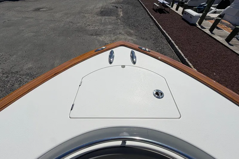 Slide: The Image of 2021 Valhalla Boatworks V-33 bow with sleek deck and wood trim. - 3