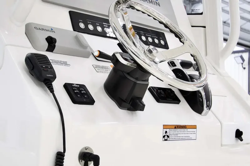 Slide: The Image of Steering console of 2027 Regulator 24XO boat with Garmin electronics and controls. - 4