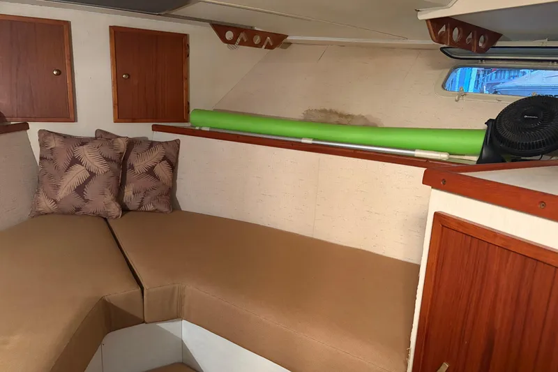 Slide: The Image of Interior of 1971 Chris-Craft 42 Commander boat with cushions and wooden cabinets. - 20